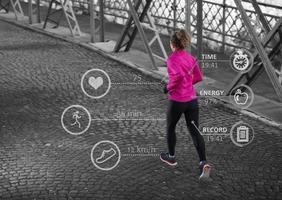 Woman running across the bridge photo