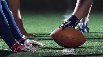 american football players are ready to start photo