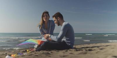 Couple enjoying time together at beach photo