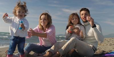 Young family enjoying vecation during autumn photo