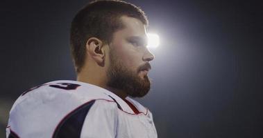 portrait of young confident American football player photo