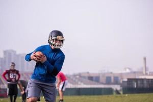 american football team in action photo