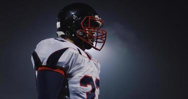 portrait of young confident American football player photo