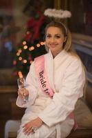 woman drinking champagne at spa photo