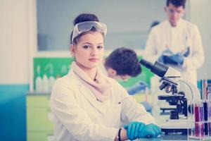 Group of young medical students doing research photo