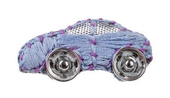 car brooch embroidered by blue silk threads photo