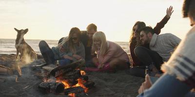 Friends Relaxing At Bonfire Beach Party photo