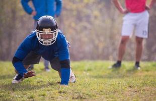 american football player in action photo