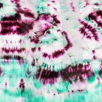 magenta and green spots on nodular batik photo