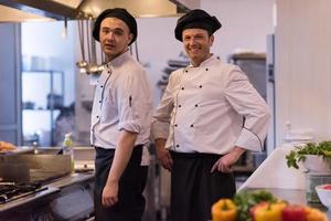 Portrait of two chefs photo