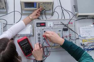 students doing practice in the electronic classroom top view photo