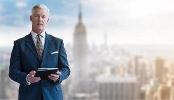 Portrait of smiling senior businessman photo