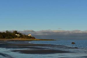 Breathtaking view of a cape cod beach woth large homes photo