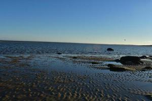Captivating sand ripples on the shore of cape cod photo