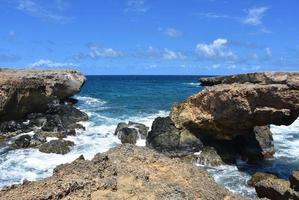 Scenic Seascape with Lava Rock Formations in Aruba photo