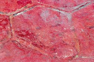 bonito rojo naranja pared piedra suelo suelo textura trama mexico. foto