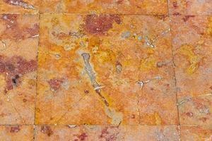 Beautiful red orange wall stone floor ground texture pattern Mexico. photo