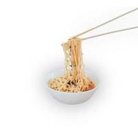 Plate with instant noodles and food sticks photo