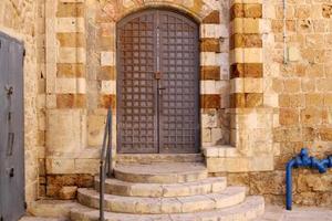 City entrance doors to a building in a big city in Israel. photo