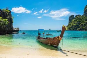 longtail boat on Hong island, Krabi, Thailand. landmark, destination Southeast Asia Travel, vacation and holiday concept photo