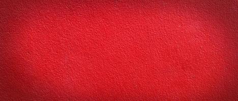 amplia textura de pared roja panorámica para el fondo con espacio de copia para el diseño foto