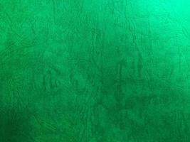 Green paper texture background with pattern for design. Copy space for text and work photo