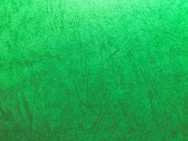 Green paper texture background with pattern for design. Copy space for text and work photo
