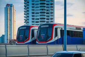 Bangkok, Thailand  May 29  BTS Sky Train Passing Taksin Bridge Saphan Taksin or Saphan Sathorn in the Evening on May 29, 2022 in Bangkok, Thailand. photo