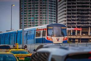 Bangkok, Thailand  May 29  BTS Sky Train Passing Taksin Bridge Saphan Taksin or Saphan Sathorn in the Evening on May 29, 2022 in Bangkok, Thailand. photo