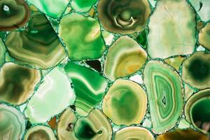 Beautiful background with green agate slices photo