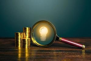 An idea that makes money. Investment in a promising startup, new business. Research and development, innovative technologies. Education and skills. Knowledge, science. Patenting. Copyright dividends photo