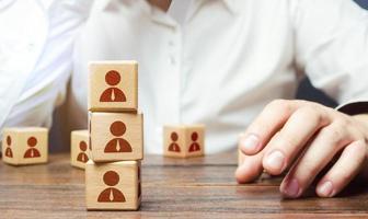 Employer recruits employees. Assemble a team from the submitted candidates and new workers. Staff and Human Resource Management. Team building, teamwork cooperation. Employment. Personnel selection photo