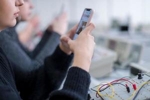 female student using a mobile phone photo
