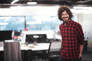 Portrait of smiling male software developer photo