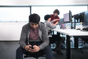 software developer using mobile phone photo