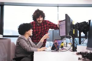 software developers couple writing programming code photo