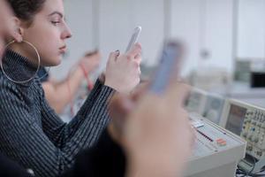 female student using a mobile phone photo