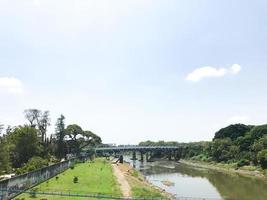 A pedestrian bridge for public transportation under the Bengawan Solo river Indonesia photo