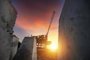 Construction site of water supply storage tower with tower crane construction of water storage buildings A beautiful sky view of the building's construction. Landscape with modern city photo