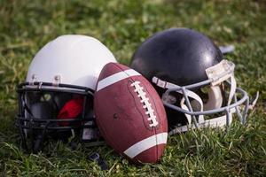 American football helmets and ball photo