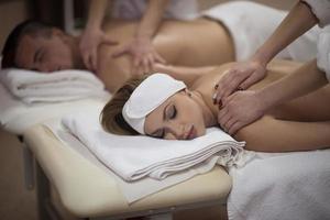 couple receiving a back massage photo