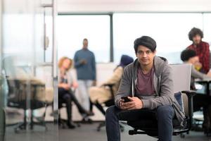 software developer using mobile phone photo