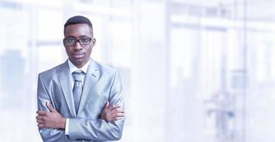 Young businessman in his office photo