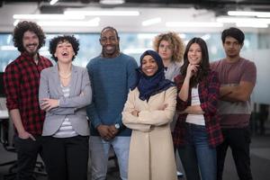 portrait of young excited multiethnics business team photo