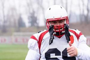 portrait of young confident American football player photo