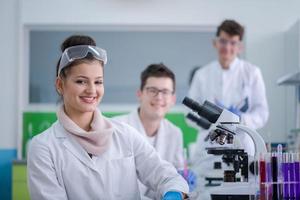 Group of young medical students doing research photo