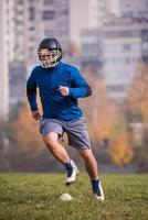 american football player in action photo