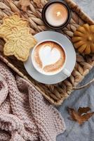 Fall flat lay with coffee and autumn decor photo