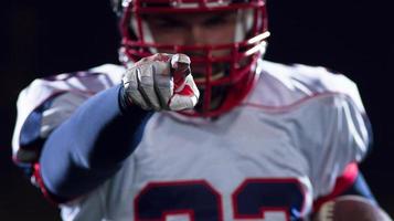 portrait of confident American football player photo