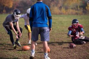 american football team in action photo